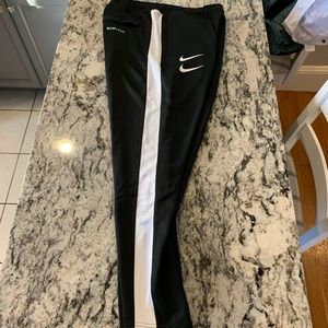 nike swoosh poly knit pants